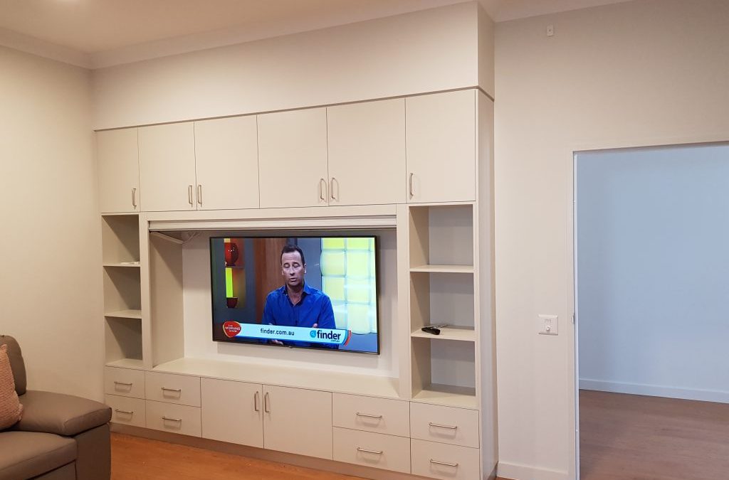 LG 65″ 4K LED Wall Mounted in Entertainment Console