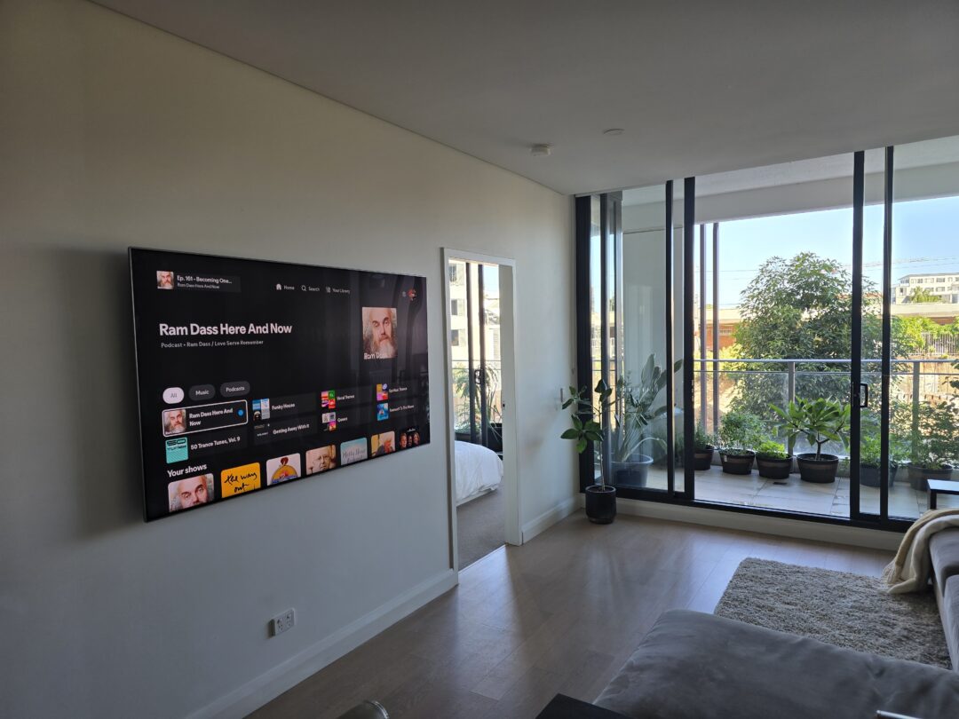 Samsung TV wall mounted in apartment living room