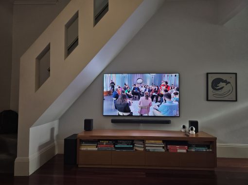 65-inch Samsung QLED TV & Soundbar wall mount installation on rendered brick wall